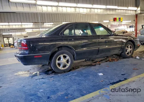 1999 Oldsmobile 88 Base z USA, uszkodzony, nr VIN 1G3HN52K6X4834101